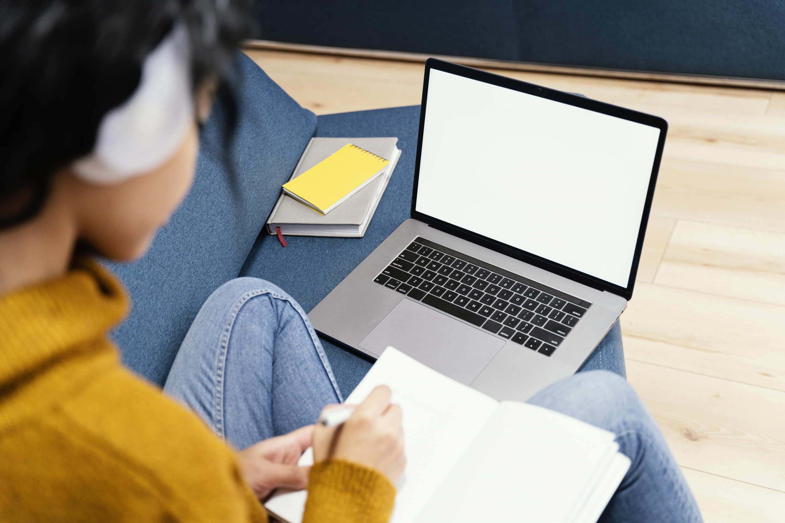 teenage-girl-with-headphones-and-laptop-during-online-school